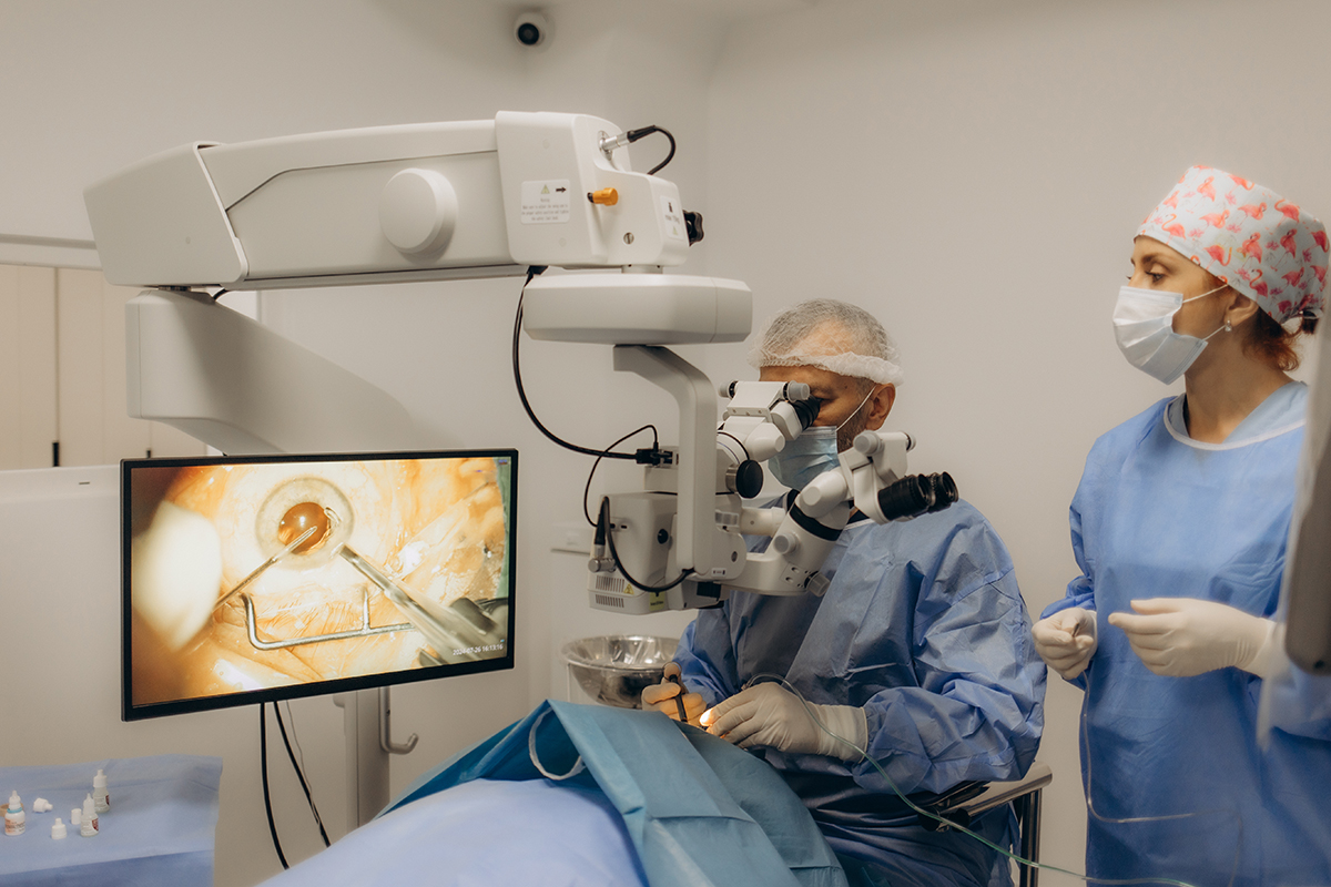 Medical Team Performing Surgical Operation in Bright Modern Operating Room